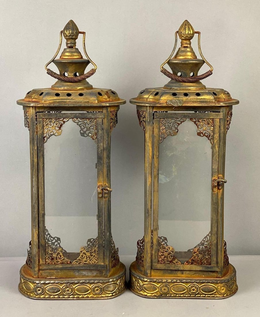 Group of 2 Modern Ornate Hanging Lanterns: one measure 20 inches in length.