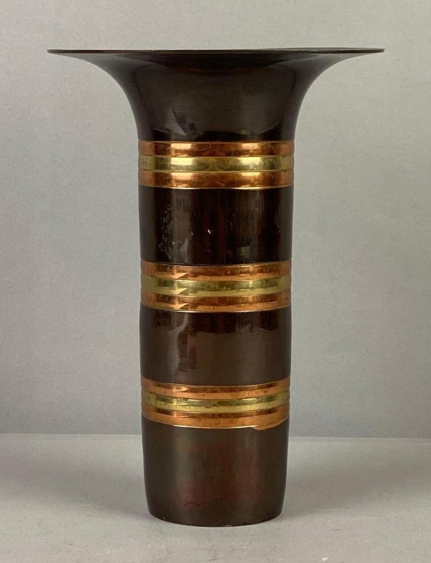 Brass Indian Flower Vase: Measure 10 inches in length.