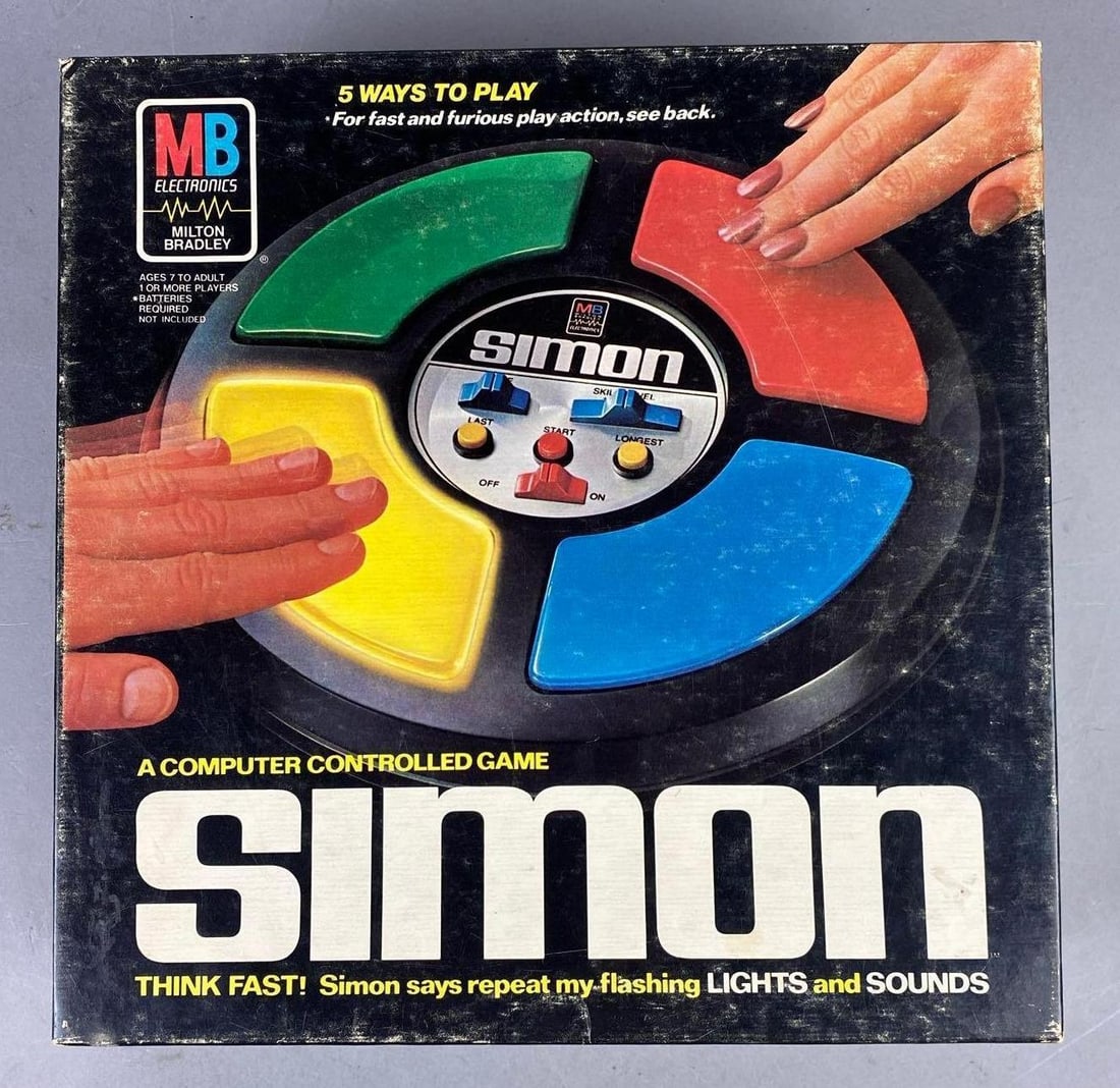 Vintage 1978 MB Electronics Simon Game: in original packaging. Has some battery corrosion. Untested. Measure H 3 1/2 x W 11 x L 11 inches.