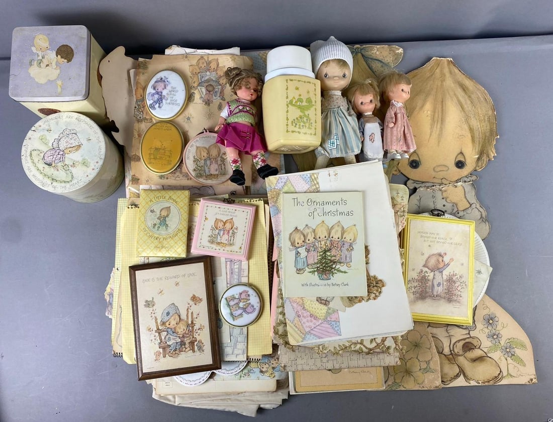 Group of Assorted Betsey Clark Precious Moments Items: Largest measures L 24 x W 11 inches. Rips and tears throughout. Circa 1970s.