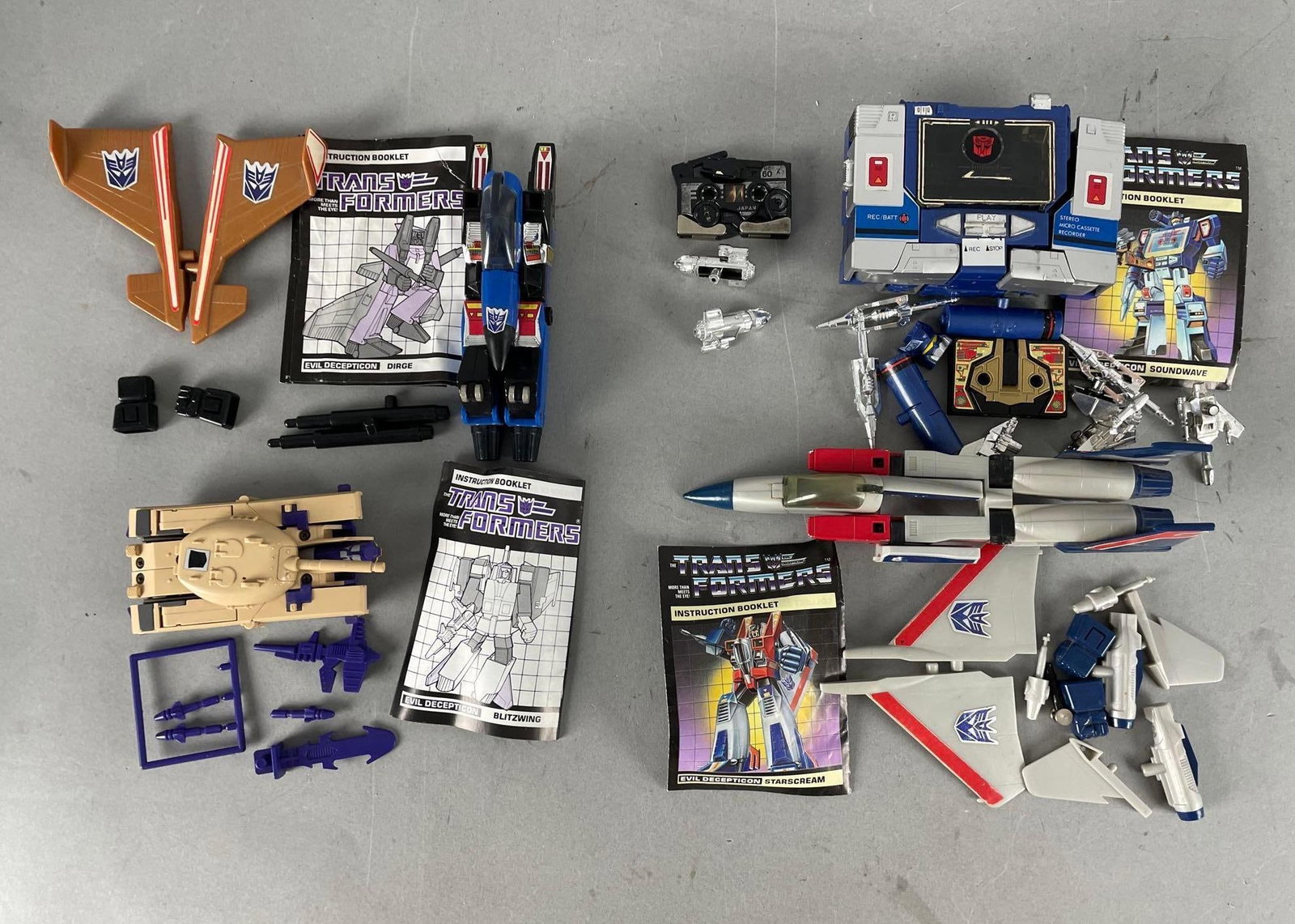 Group of Hasbro Transformers Toys: Includes starscream, soundwave, blitzwing, dirge