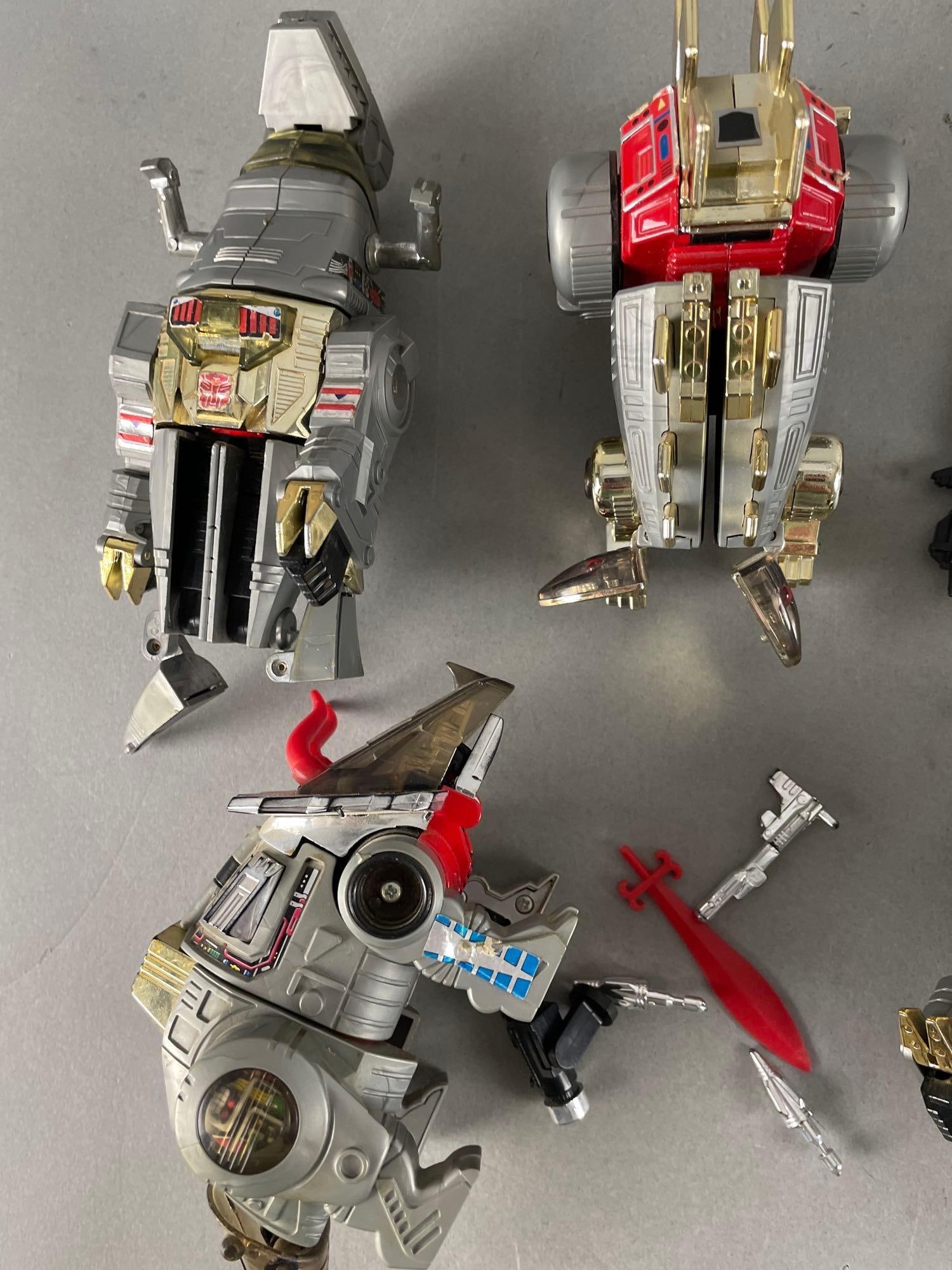 Group of Hasbro Transformers Heroic Dinobot Toys: Includes snarl, grimlock, and more