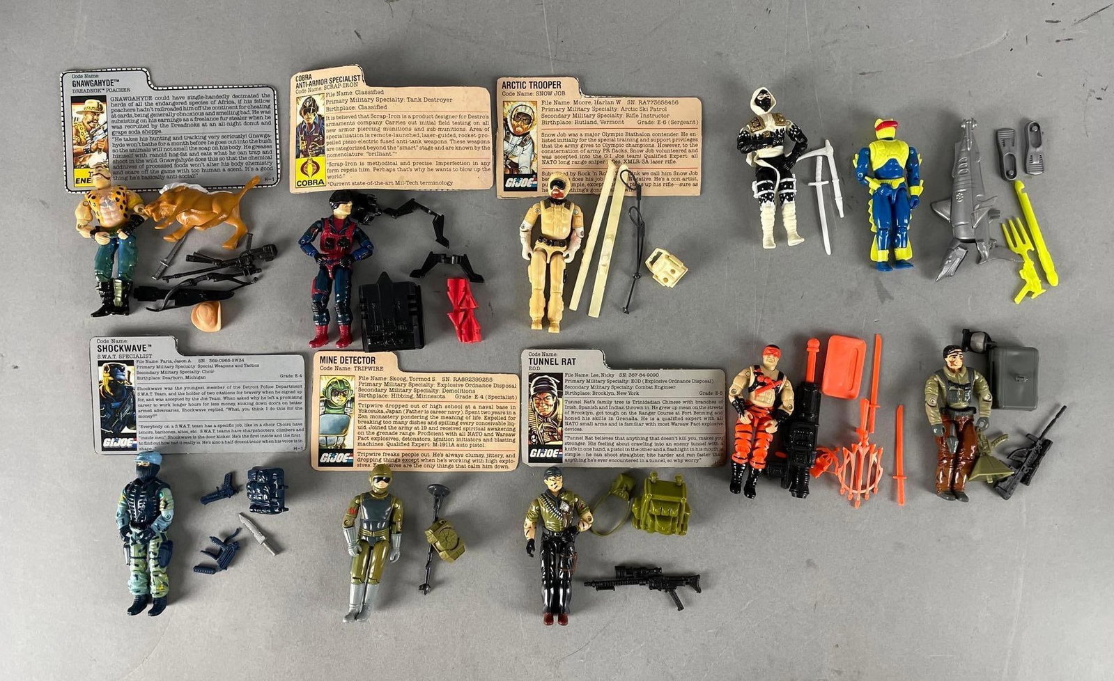 Group of 1980s G.I. Joe Action Figures and Accessories: Includes file cards, shockwave, tunnel rat