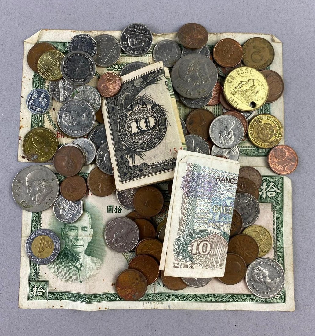 Group of Assorted Foreign Currency: Includes Canadian Coins, Mexican pesos, and more.