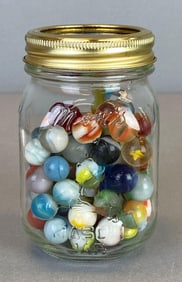 Glass Jar of Assorted Glass Marbles