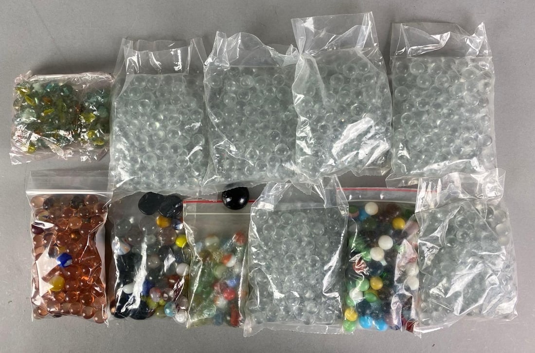 Group of Assorted Glass Marbles and More: Largest measures 1.2 inches