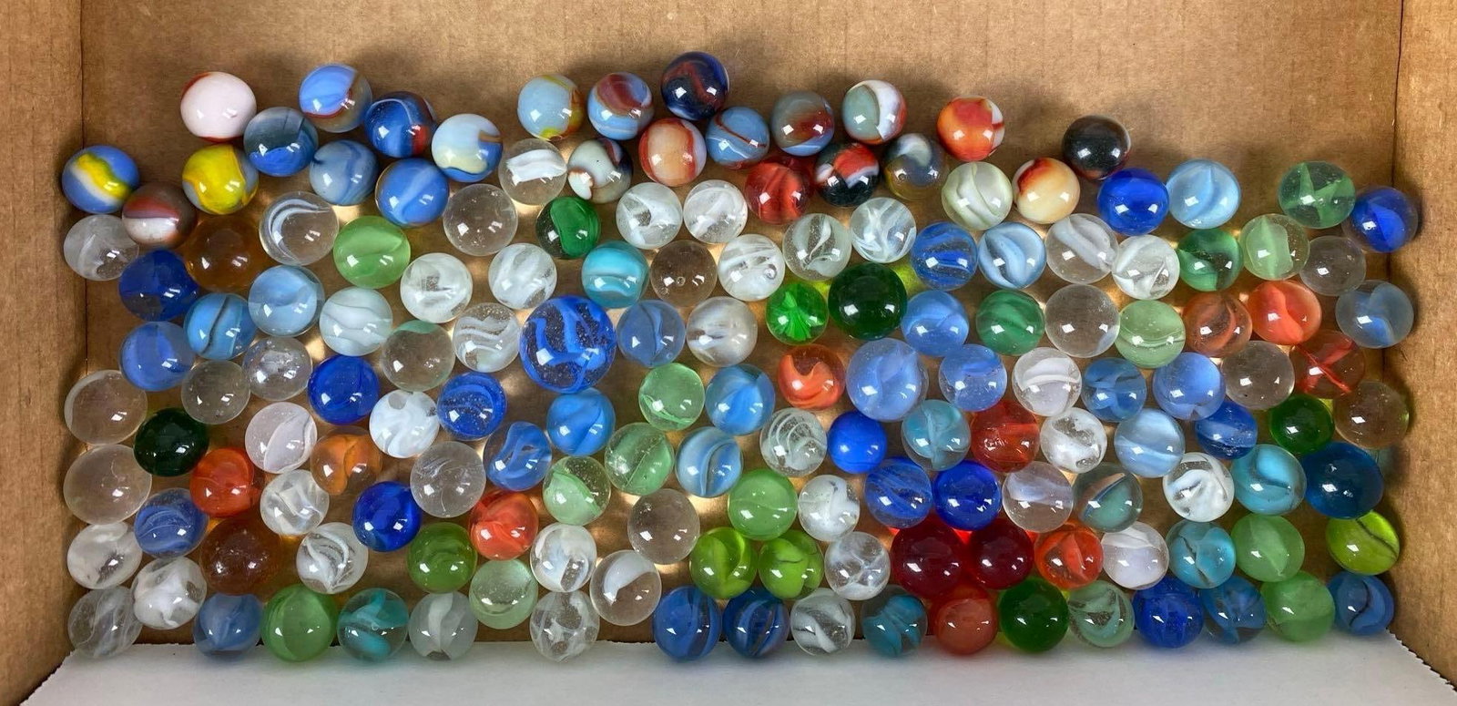 Group of 140+ Assorted Glass Marbles: Largest measures .9 inches
