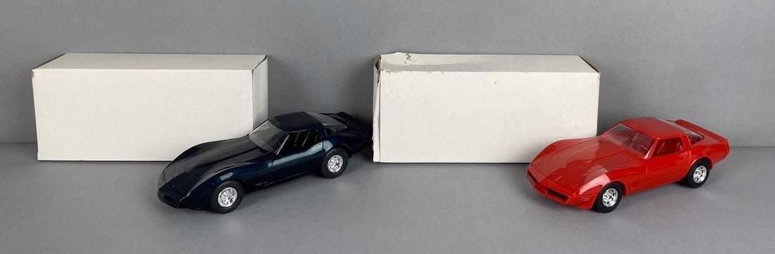 Group of 2 1981 Chevy Corvette Hardtop Dealership Promo Cars: Red orange, blue. Original boxes