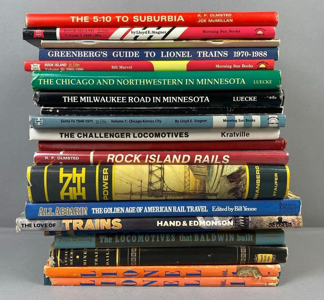 Group of Assorted Railroad Books And More: Includes Lionel Trains Book, Rock Island book, and more. Largest measures L 13 x W 9 inches.