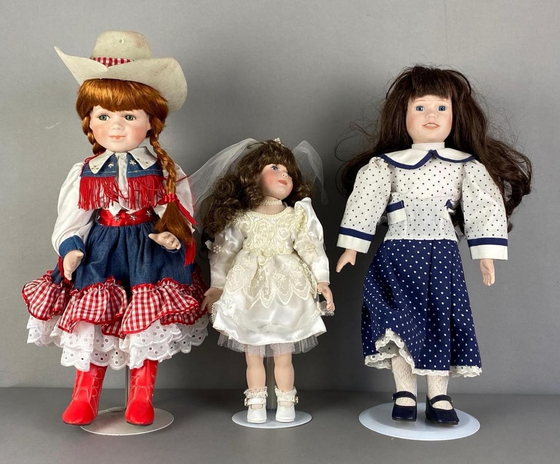 Group of 3 Vintage Porcelain Fashion Dolls: Largest measures 17 inches H