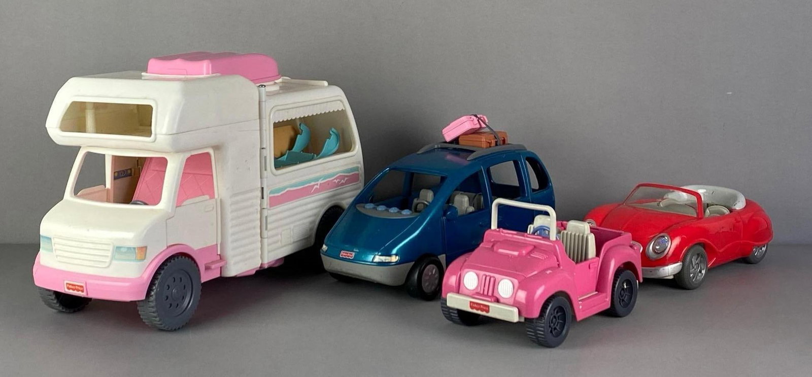 Group of Fisher-Price Toy Vehicles: Largest measures 11 inches H x 8 inches W x 18 inches D