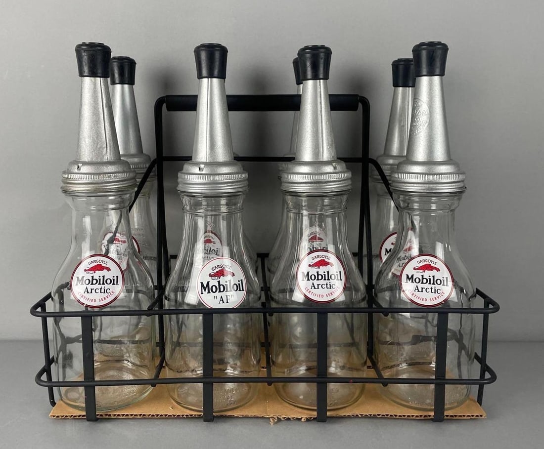 Group of 8 Vintage Glass Quart Oil Bottles with Carrier: Modern gargoyle Mobiloil decals, modern carrier, set measures 14 1/4" x 17 1/2" x 9"