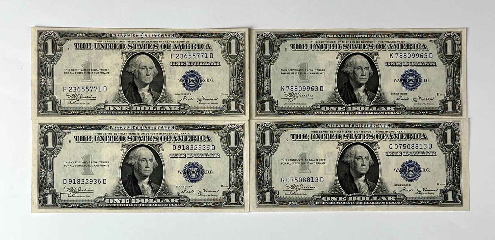 Group of 4 1935 B US $1 Blue Seal Silver Certificates (1 of 2)