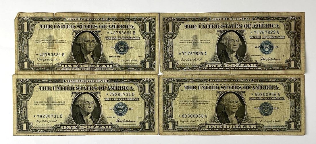 Group of 4 1957 US $1 Blue Seal Silver Certificates Star Notes (1 of 2)