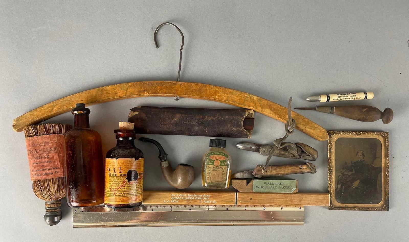 Group of Vintage Advertising Items and More: Includes tobacco pipe, knife, Lysol bottle, 17" hanger