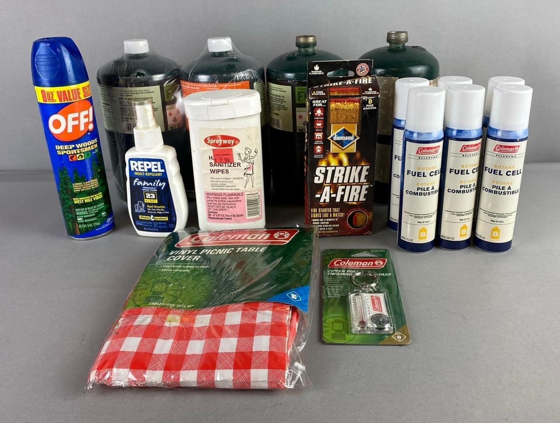 Group of Assorted Camping Fuel and More: Includes matches, insects repellent, and more. Largest measure 8 inches inches length.
