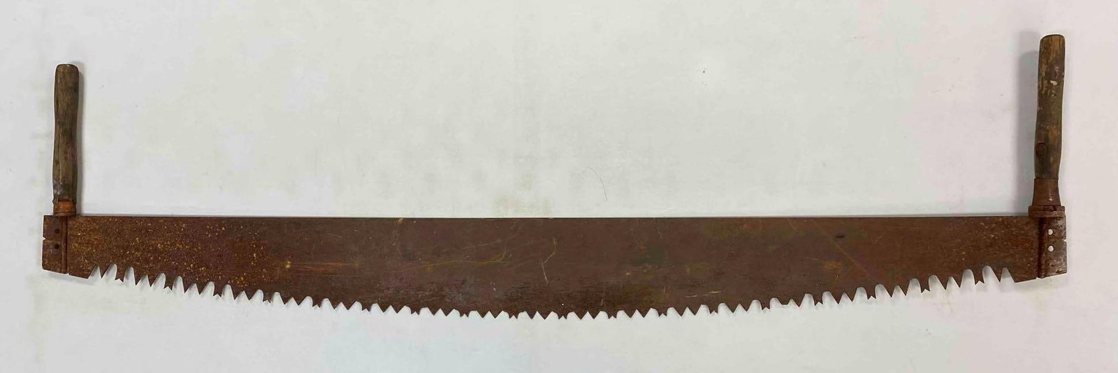 Antique Two-Man Crosscut Logging Saw: Has rust throughout. Measured 60 inches in length.
