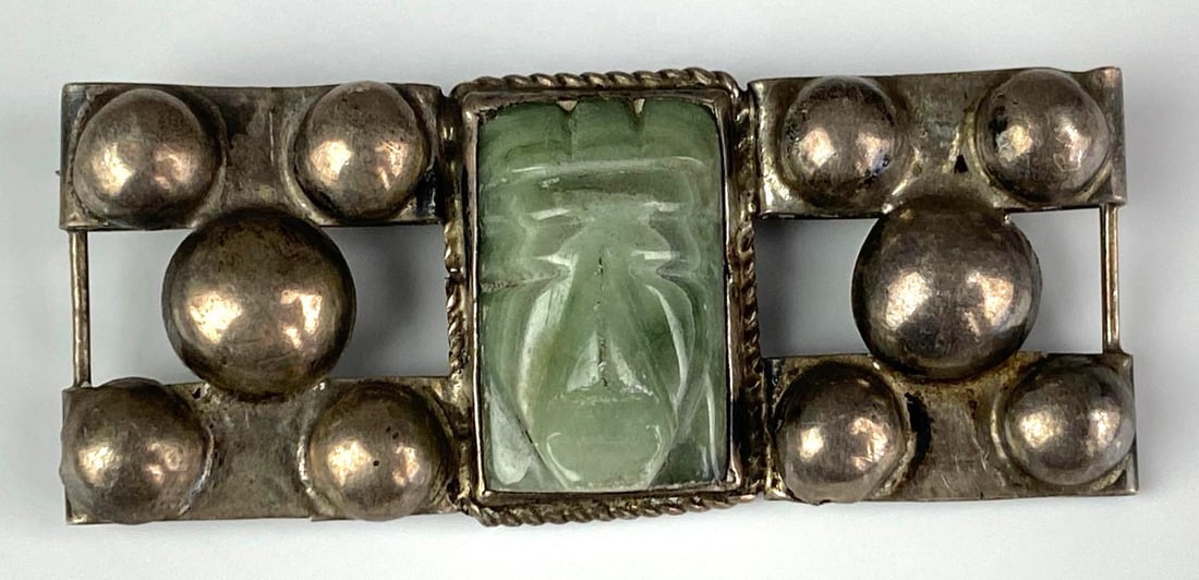 Sterling Silver Carved Jade Brooch: Measures 1 inches H x 2 1/4 inches W