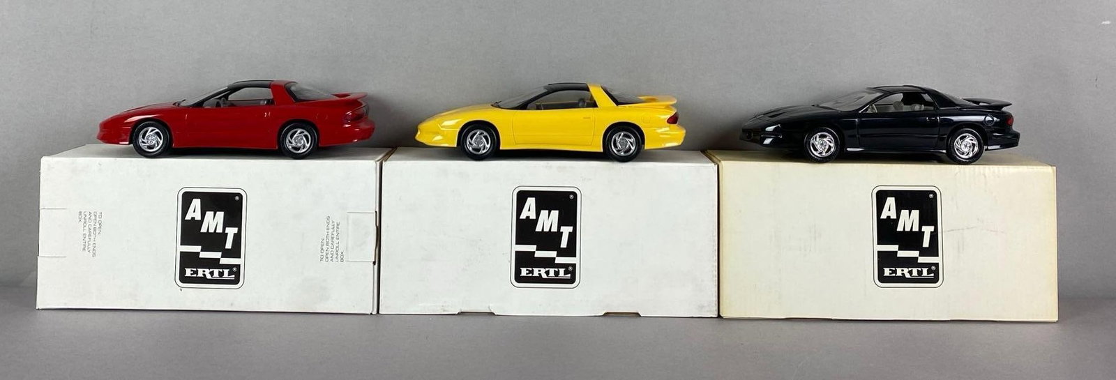Group of 4 AMT ERTL 1993 Pontiac Firebird Dealership Promo Cars (1 of 4)