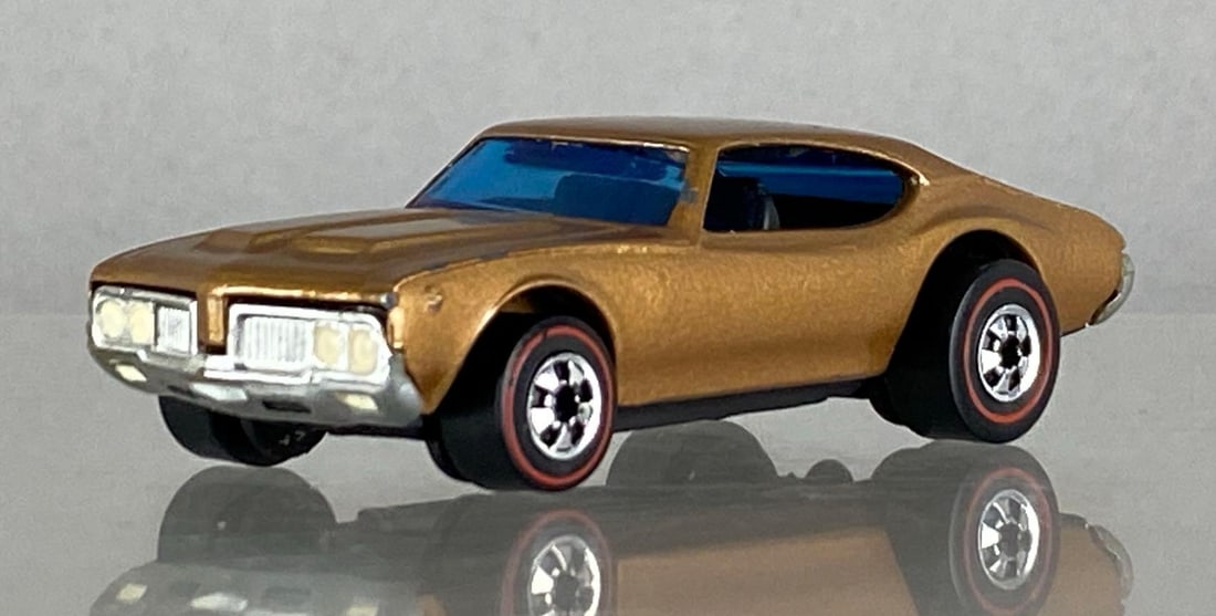 Repainted/Restored Mattel Hot Wheels Redline: Made in hong kong, Die-Cast, Redline Tires, blue windows, orange paint, repainted, repaired base, unknown make, possibly multiple models restored together
