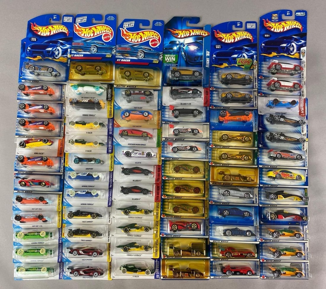 Group of Mattel Hot Wheels Die-Cast Cars: sealed, includes flight 03, open road-ster, track hammer and more