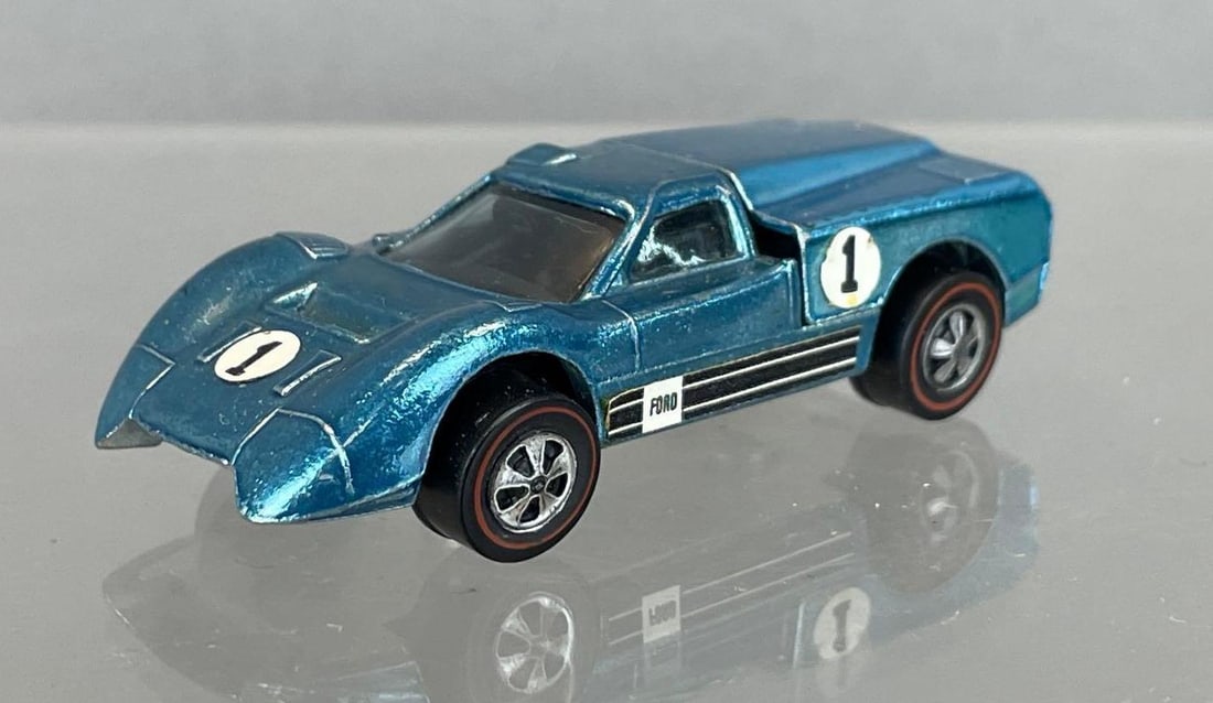 Mattel Hot Wheels Redline Ford J-Car Die-Cast Vehicle: Light blue spectraflame, no. 1, black interior, tinted windows