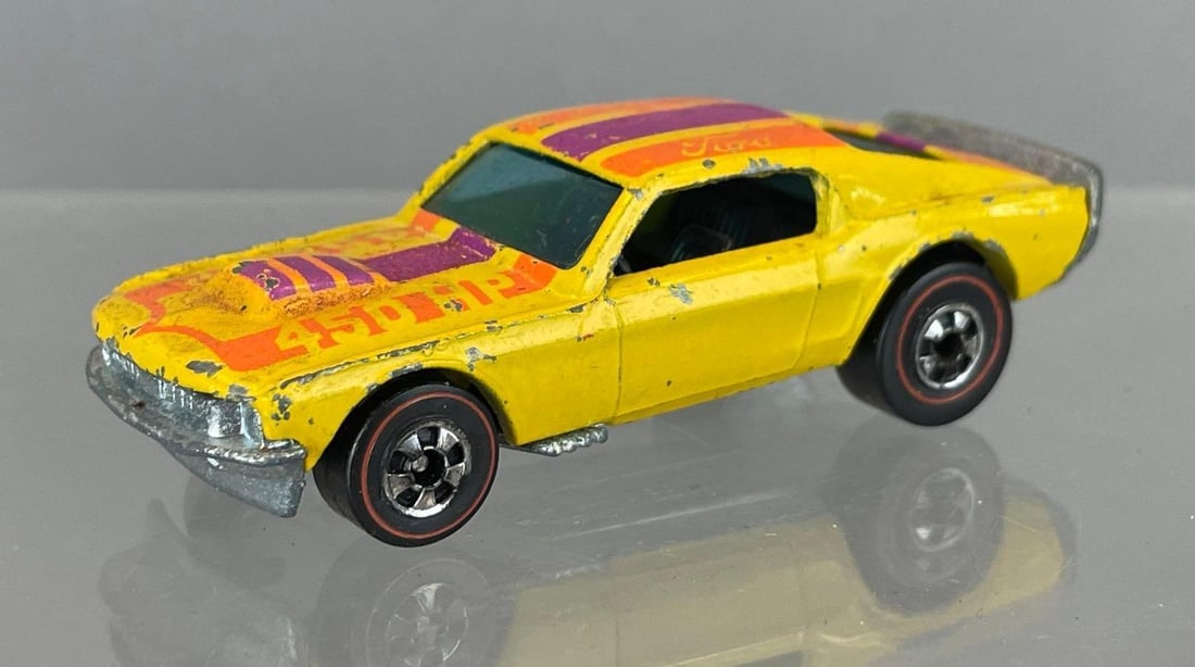 Mattel Hot Wheels Redline Mustang Stocker Die-Cast Vehicle: Yellow, black interior, blue windows