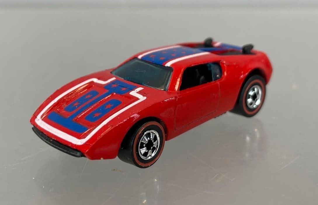 1969 Mattel Hot Wheels Redline Warpath Die-Cast Vehicle: Red with patriotic decals, black interior, blue windows