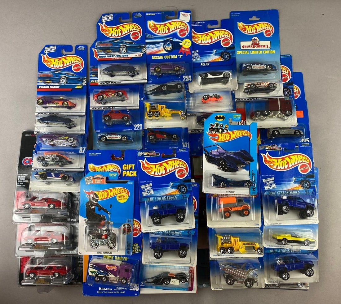 Group of 30+ 1990?s Mattel HotWheels 1/64 Scale Die-Cast Vehicles and More: Like new in original packaging.