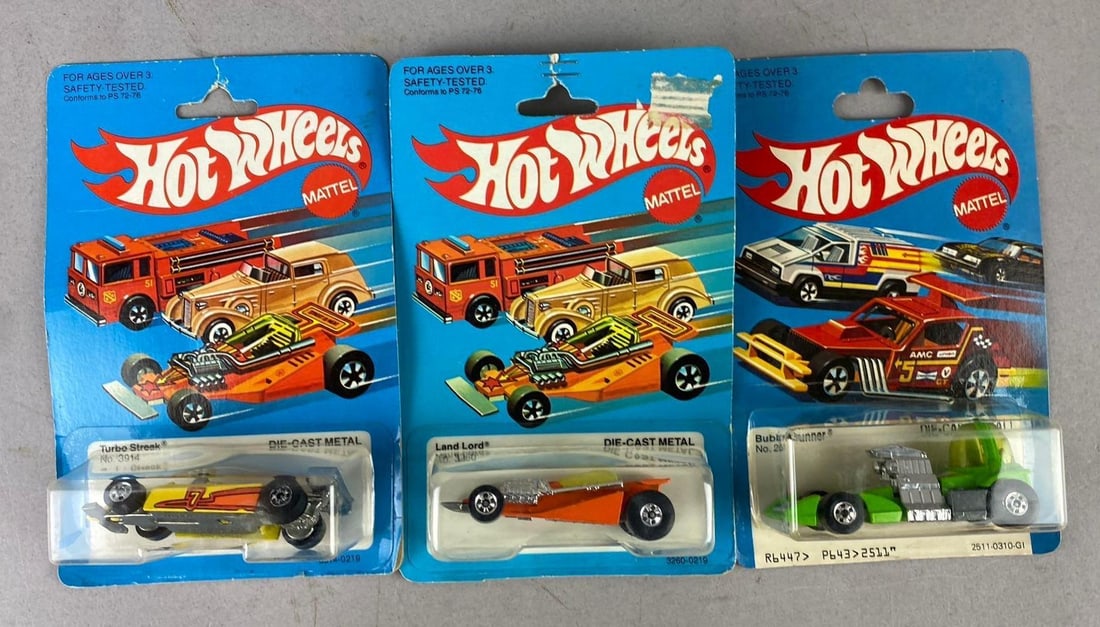 Group of 3 1982 Mattel HotWheels 1/64 Scale Die-Cast Vehicles: Like new in original packaging.