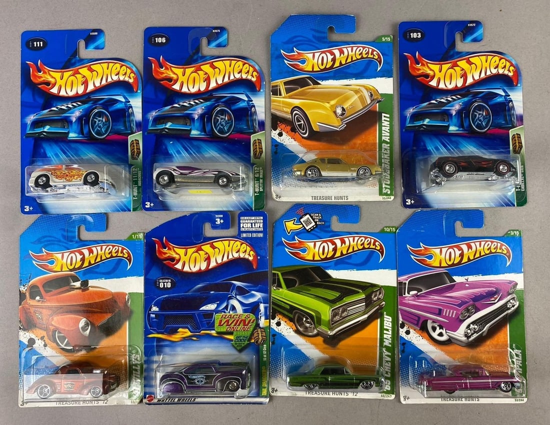 Group of 8 Mattel HotWheels: Treasure Hunts 1/64 Scale Die-Cast Vehicles: Like new in original packaging.