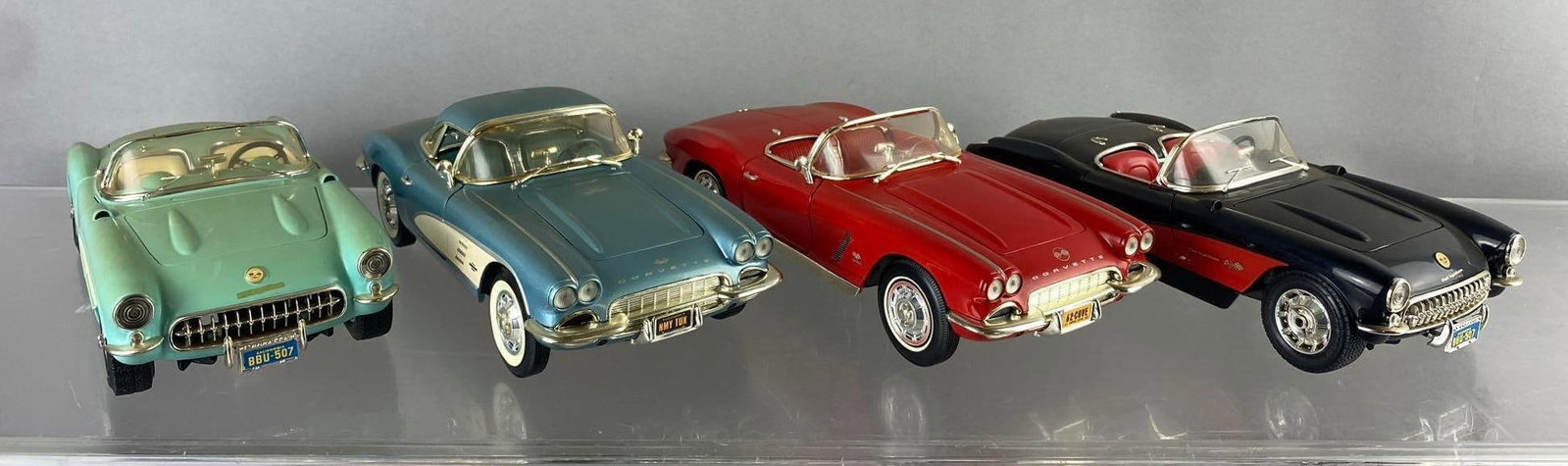 Group of 4 ERTL 1961 Chevrolet Corvette 1/18 Scale Die Cast Vehicles and More (1 of 3)