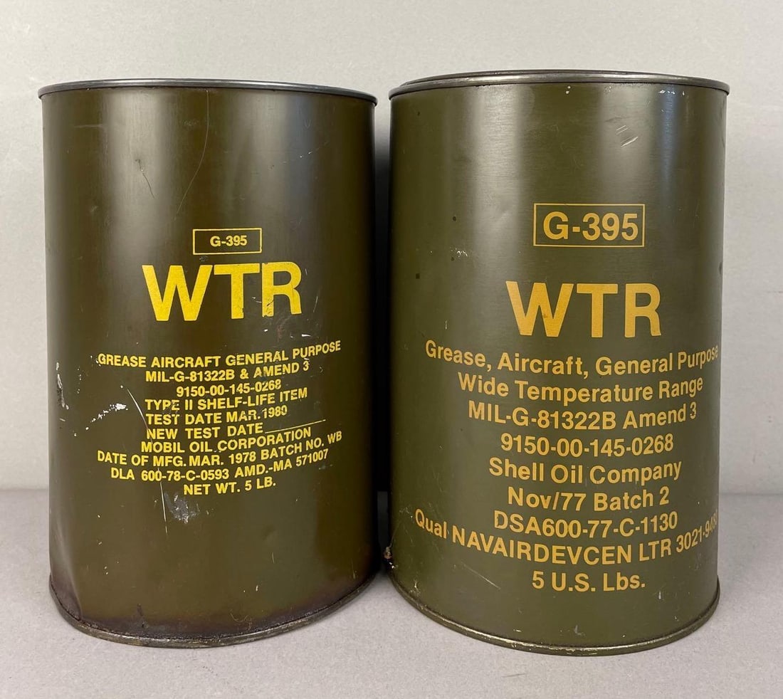 Group of 2 Vintage Military Aircraft G-395 Grease Cans: One Mobil, one shell oil, some grease in both, measure 8 inches x 5 1/2 inches