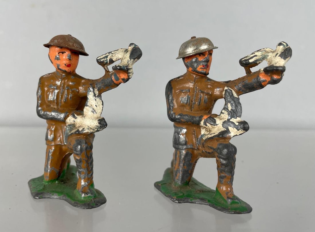 Group of 2 Vintage Barclay Lead Toy Soldiers: Pigeon dispatchers, measures 2 1/2 inches