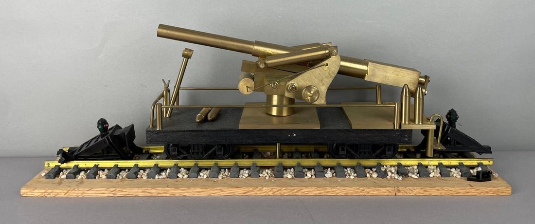Large Brass Big John Cannon Train Car Model: Swivels, plastic train stops broken, measures 9 1/4 inches x 24 inches x 5 1/2 inches