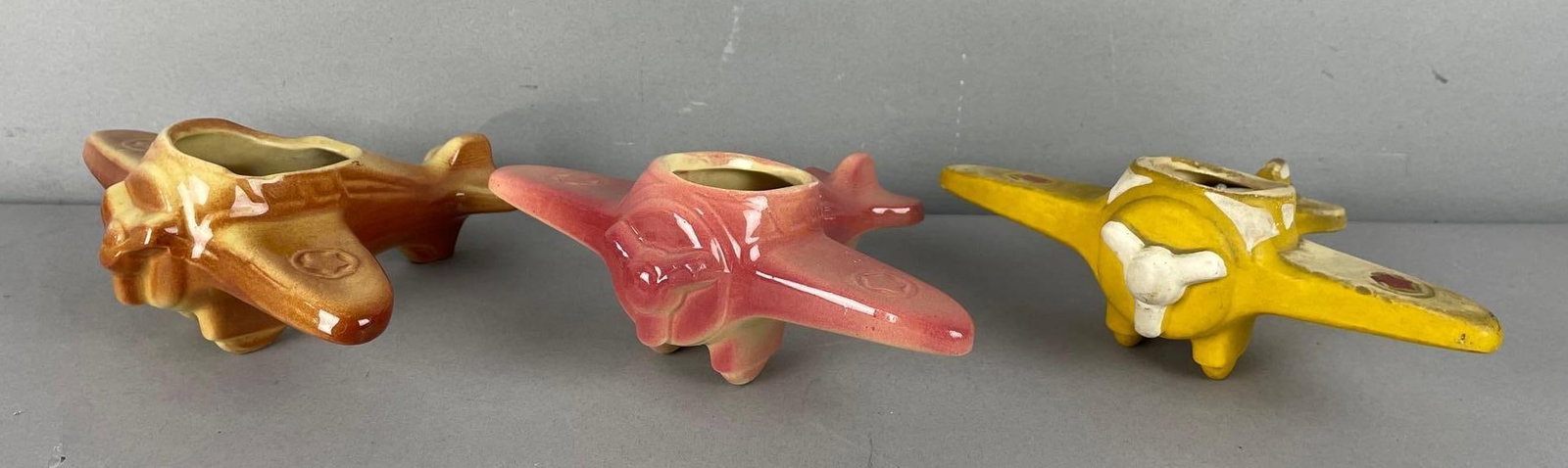 Group of 3 Vintage Ceramic Airplane Pots: Morton pottery yellow pot measures 2 3/4 inches x 7 inches x 5 1/2 inches