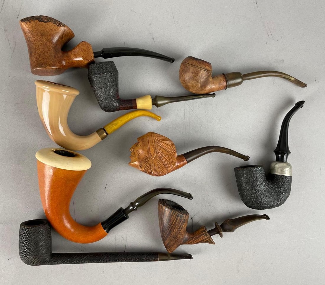 Group of Vintage Tobacco Pipes: Includes wood, Native American head, longest measures 8 inches