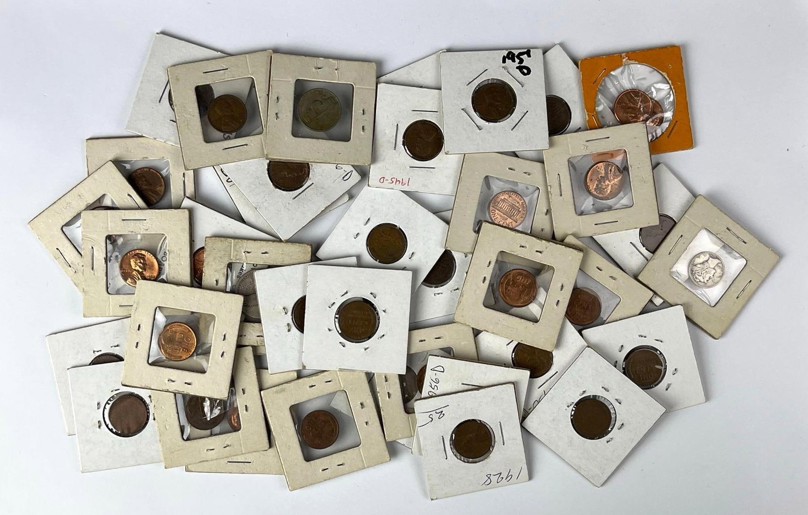 Group of 39 Assorted US Coins: Mostly Lincoln Head cents. Includes 1941 Jefferson Nickel, 1926 Standing Liberty 90% silver quarter and a 1942 Mercury silver dime.