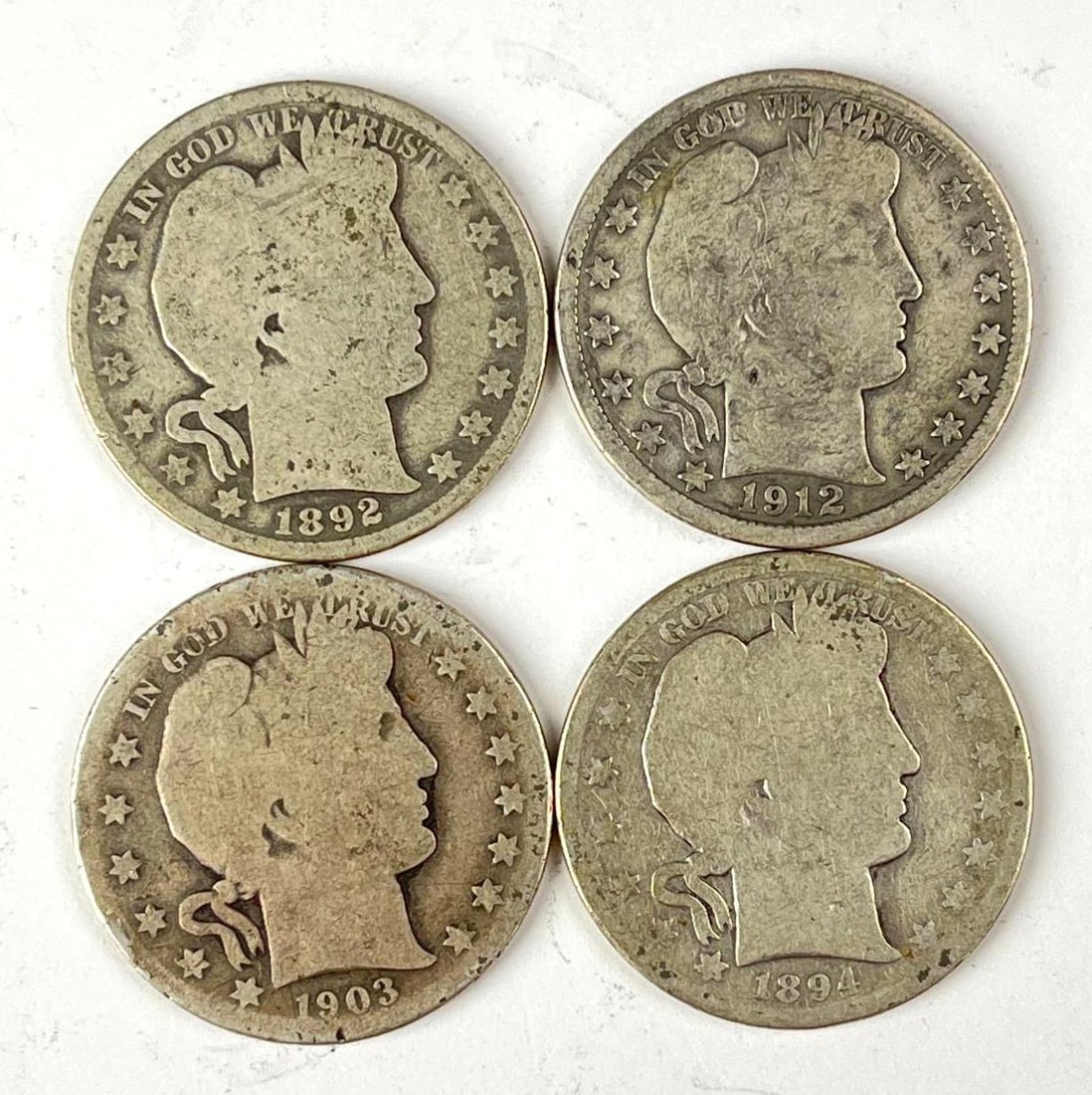 Group of 4 US Barber 90% Silver Half Dollars: Includes years 1903, 1894, 1892 and 1912.