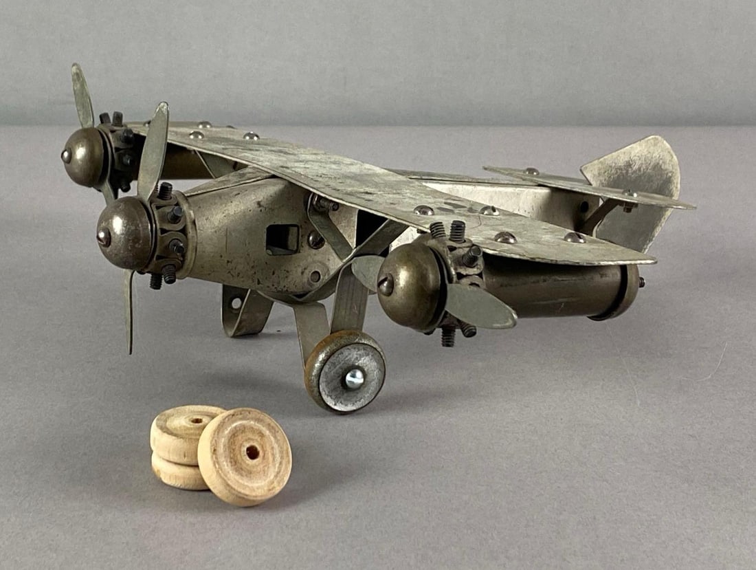 Vintage Handmade Metal Art and Crafts Airplane Model: includes 3 spare wood wheels, measures 4 inches H x 11 1/2 inches W x 10 inches D
