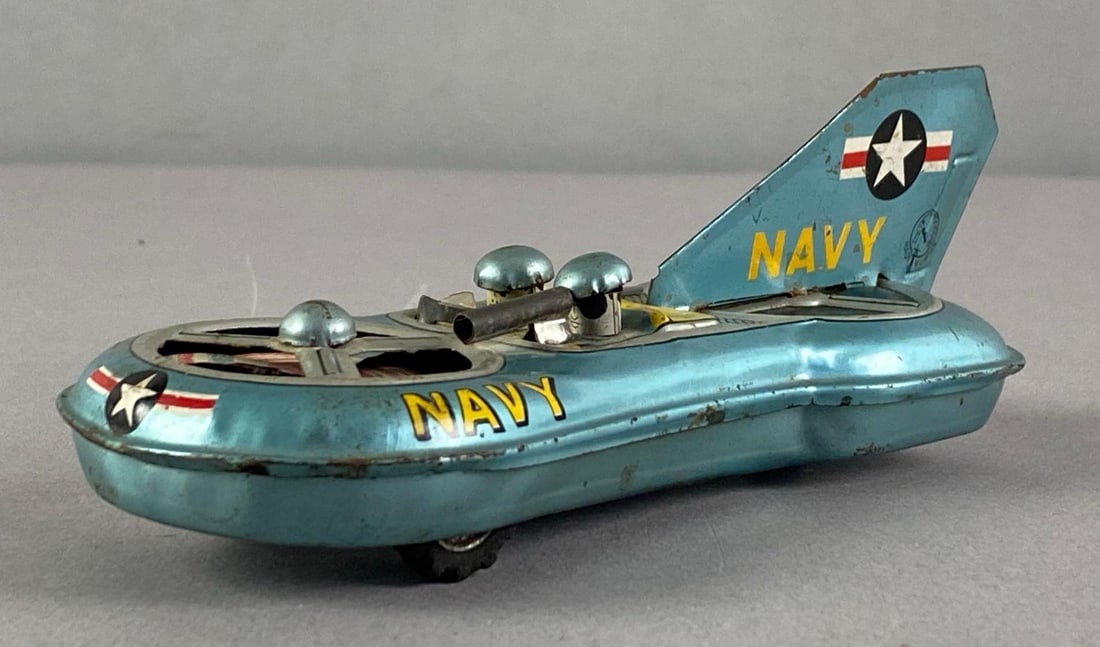 Vintage Linemar Tin-Litho Friction Navy Flying Jeep Toy: Friction and sparking in non working condition, Paint scratches and dents throughout, measures 2 inches H x 2 1/2 inches W x 6 1/2 inches D