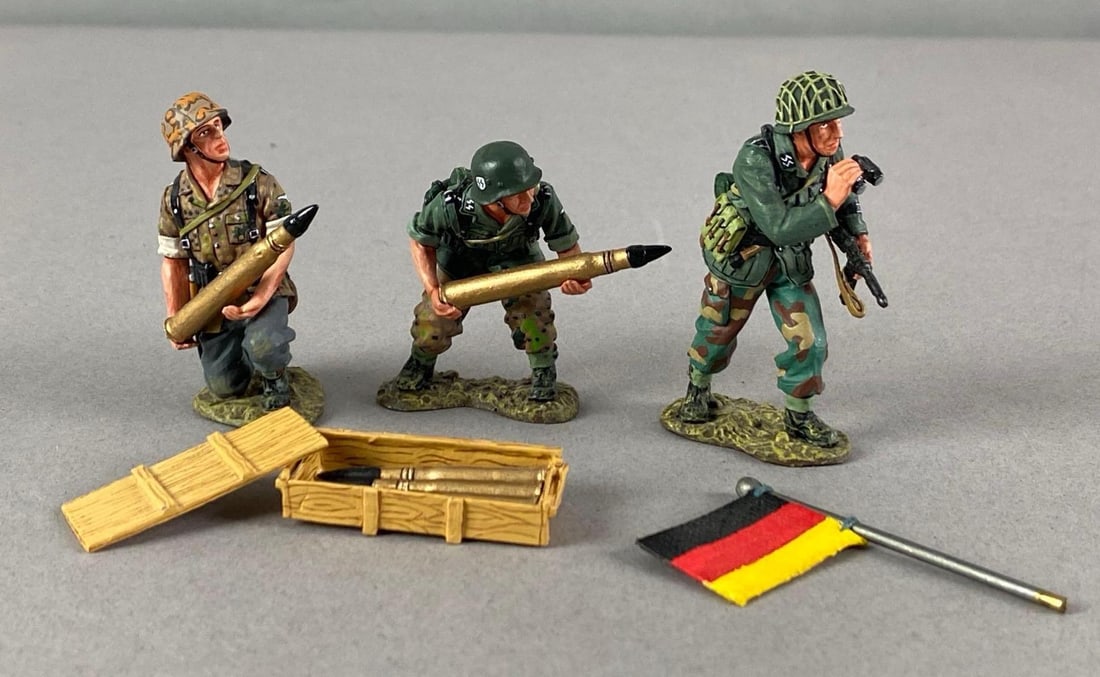 King and Country Waffen SS Normandy 1944 Metal Miniature Set: Like new in original box, Features 3 Soldiers with artillery shell box and flag, box measures 5 inches H x 10 inches W x 3 inches D