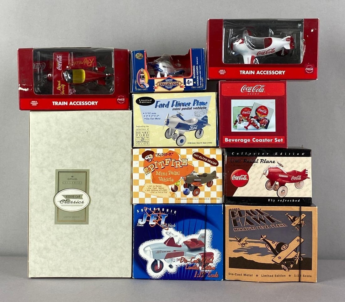 Group of 10 Coca-Cola Airplane Models and More: Includes Spitfire Mini pedal model, supersonic jet mini pedal model and more, largest box measures 10 1/4 inches H x 6 1/2 inches W x 5 1/2 inches D