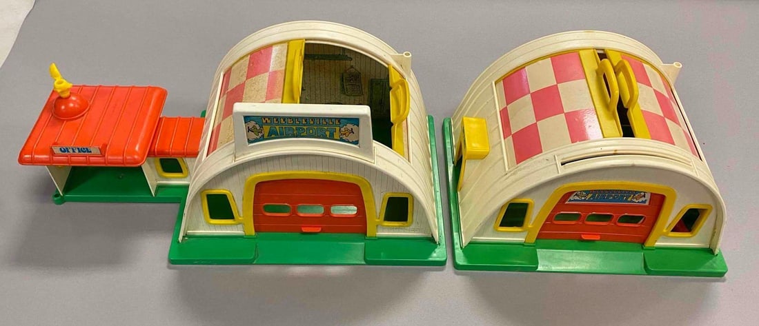 Group of 2 1975 Hasbro Romper Room Webbles Airport Playset: Missing pieces. Largest measures H 9 x W 9 1/2 x L 18 inches.