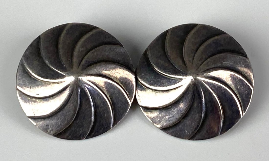 Pair of Sterling Silver Spiral Clip Earrings: Each measures 3/4 inches H x 3/4 inches W