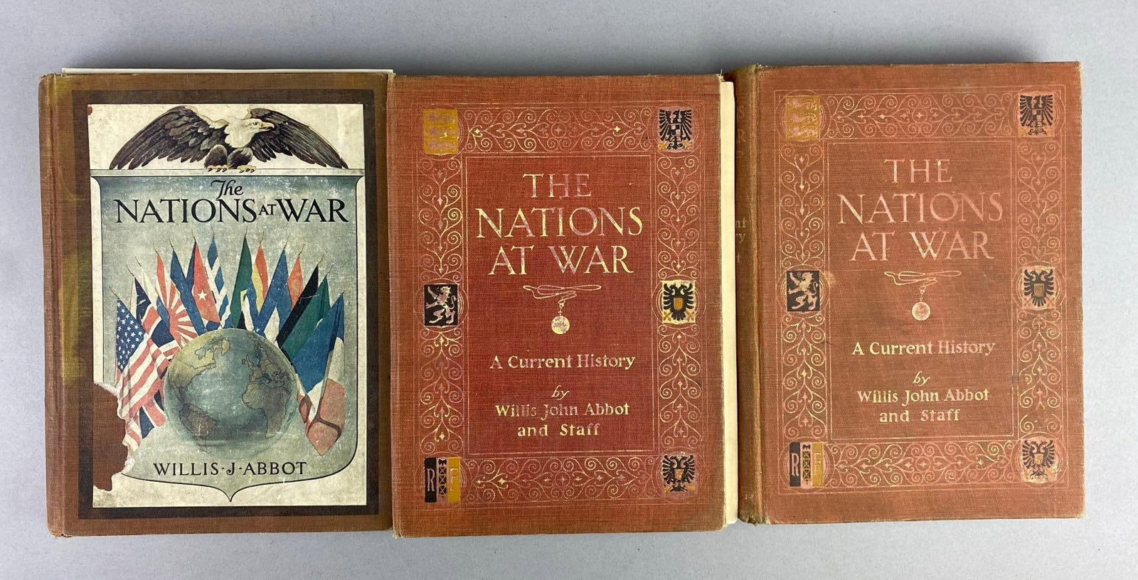 Group of 3 The Nations at War: A Current History Books: By Willis J. Abbot. Has rips and tears throughout. One measures L 10 1/2 x W 8 inches.