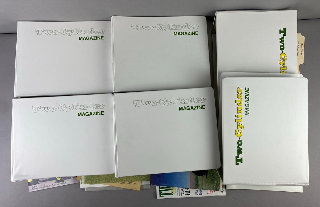 Group of Assorted John Deere Two-Cylinder Magazine: Circa 1980s. Heavy. One measures L 11 x W 9 inches.
