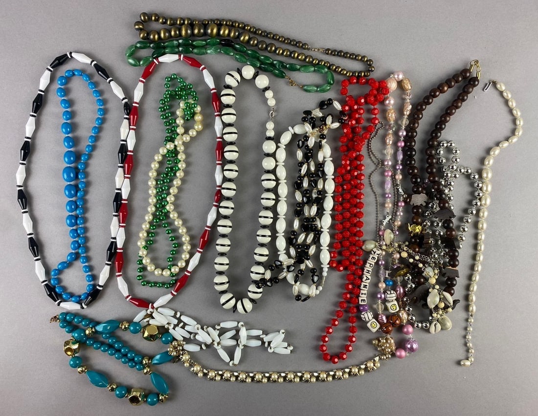 Group of Assorted Costume Jewelry: Largest measures 12 inches in length.