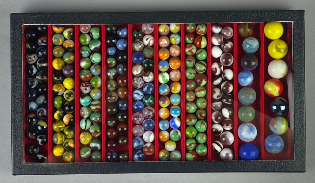 Group of 150+ Vintage Marbles: Comes in display case. Includes shooters and marbles.
