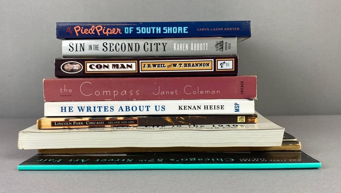 Group of 10 Chicago Themed Hardcover Books: Includes Lincoln park, the compass, and more. Largest measures L 11 x W 8 inches.